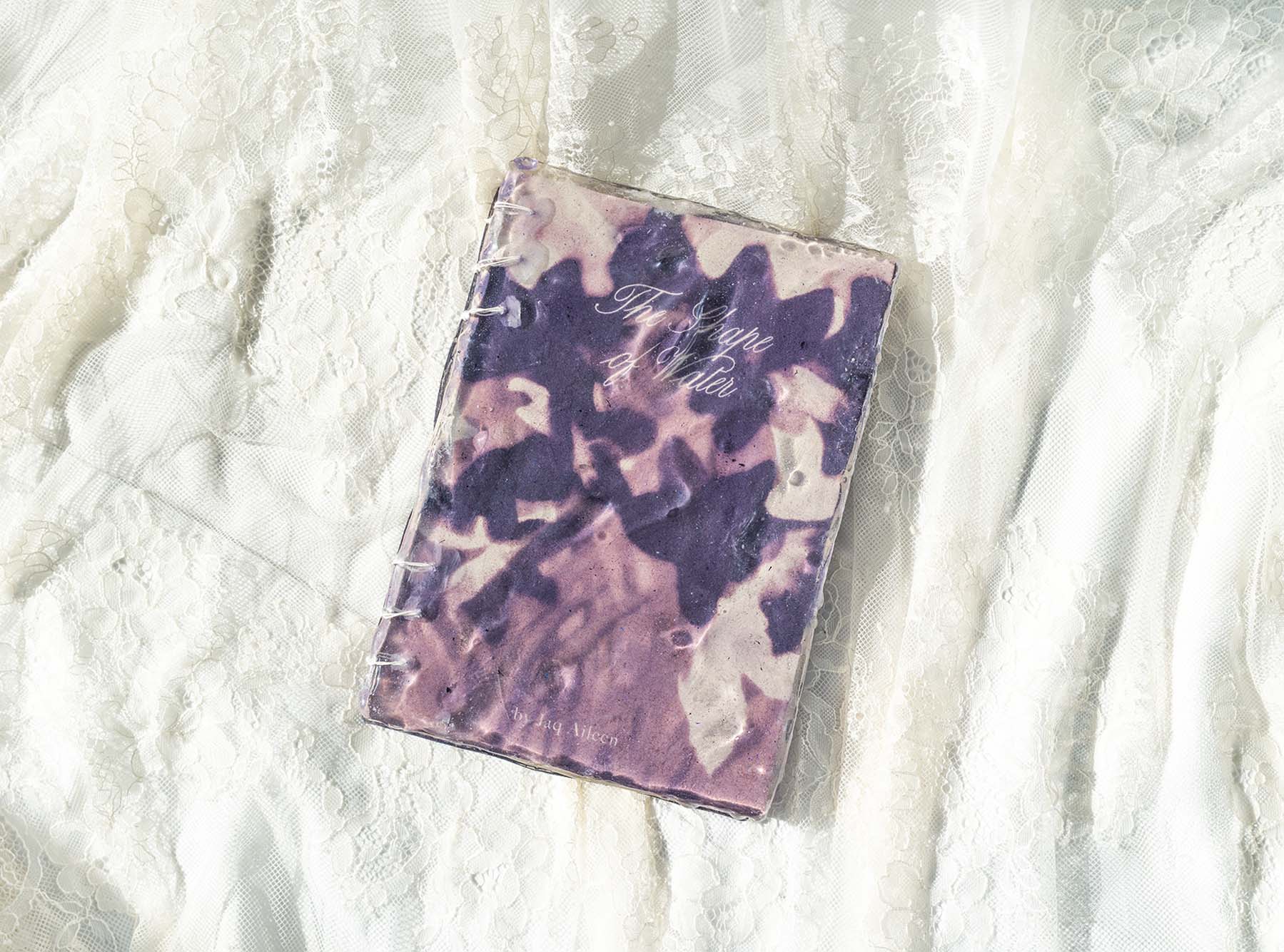 Purple resin covered artbook.